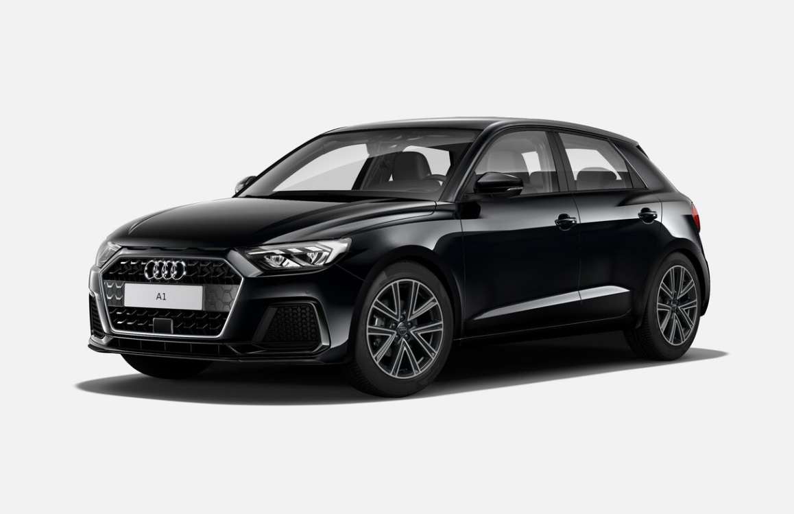 Audi A1 grise en milieu urbain